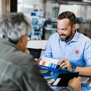 sailmaker giving advice on spinnaker cloths